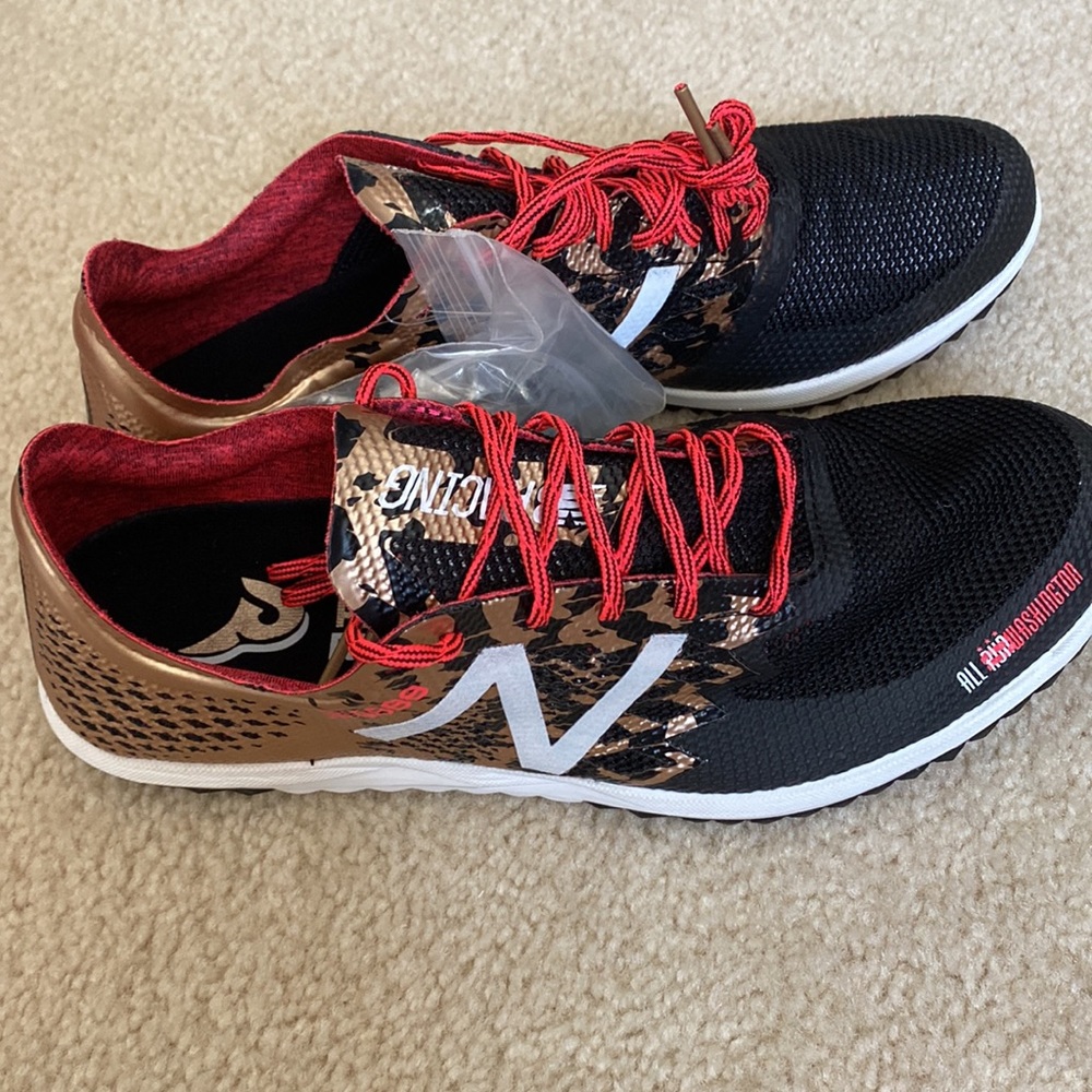 NWT Unisex track spikes